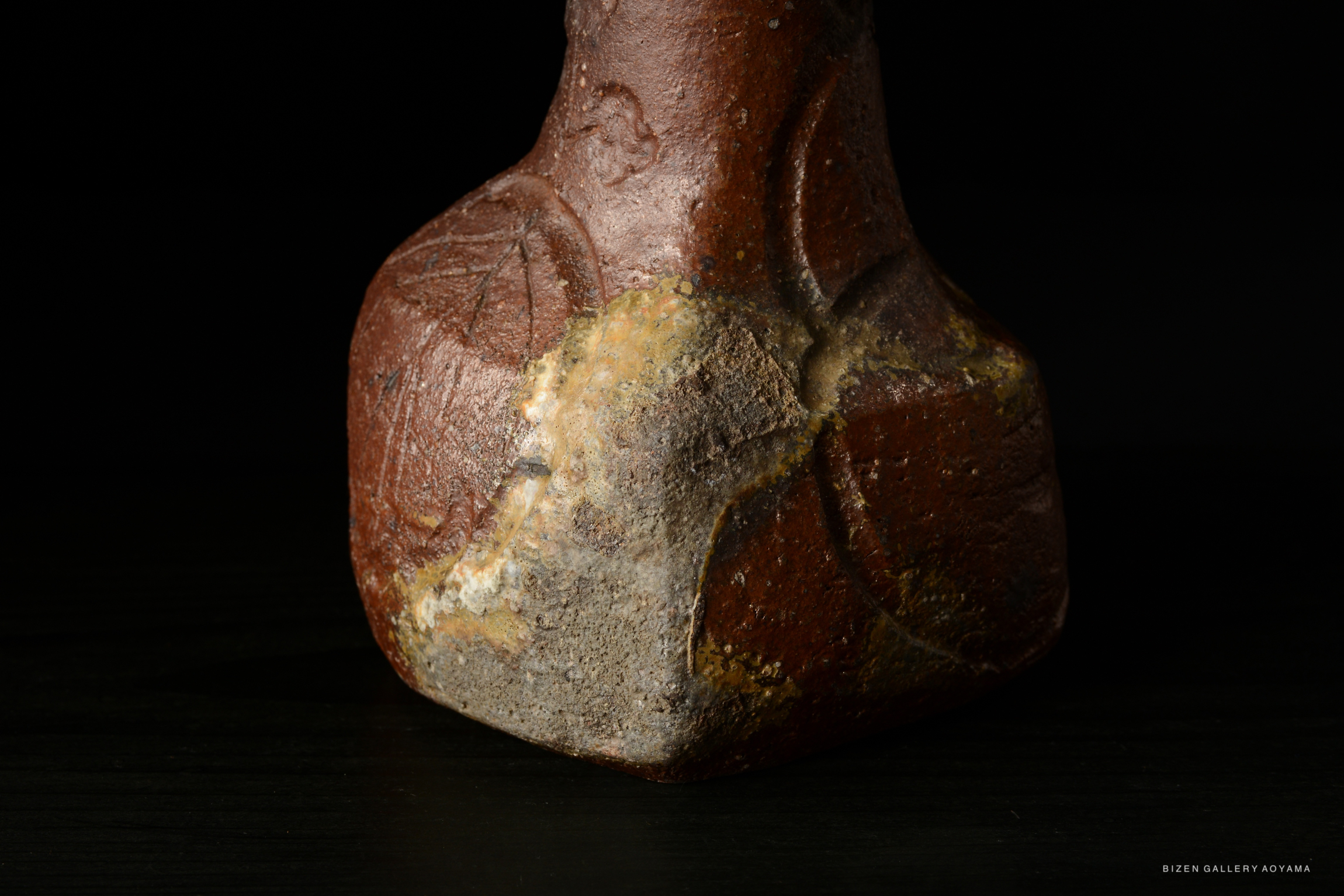 Close-up of a Bizen Kohjiguchi Hanaire (flower vase) showcasing its textured surface and detailed craftsmanship.